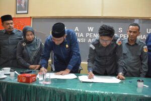 tanda tangan mou uia dan bawaslu